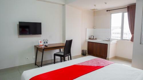Hotel Capital O 2218 Sudirman Suites Apartement