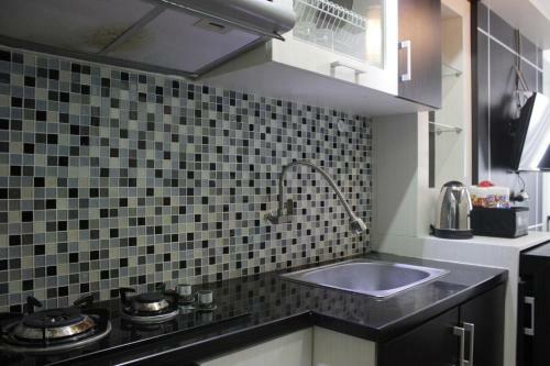 Functional Studio Room The Jarrdin Cihampelas Apartment By Travelio