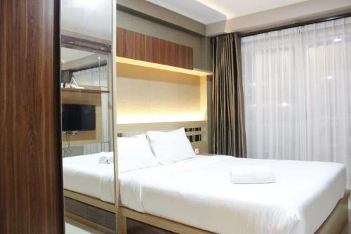 Homey Studio Room Gateway Pasteur Apartment By Travelio