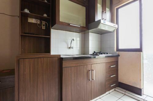 Reddoorz Apartment @ Gateway Cicadas