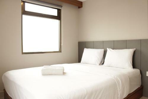 Modern Elegant 2br Apartment Tamansari Tera Residence By Travelio