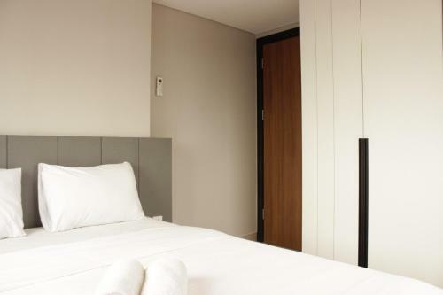 Modern Elegant 2br Apartment Tamansari Tera Residence By Travelio
