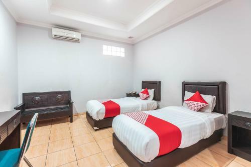 Oyo 686 Bunga Karang Hotel