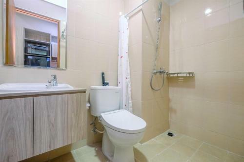 Homey And Warm Studio Apartment Oasis Cikarang By Travelio