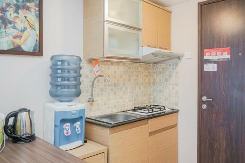 Modern Comfy 2br Serpong Greenview Apartment By Travelio