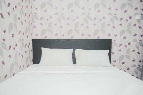 Modern Comfy 2br Serpong Greenview Apartment By Travelio