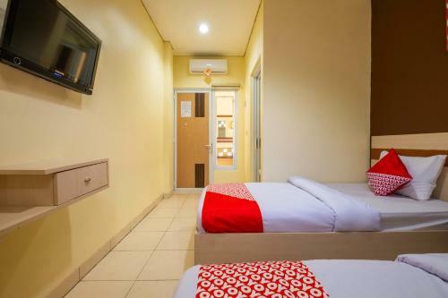 Hotel Oyo 2947 Cluster Harris Home Stay & Kos