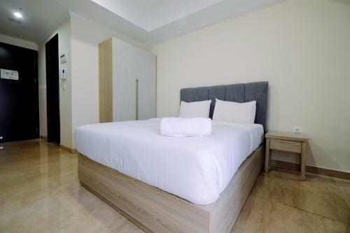 Cozy Studio Menteng Park Apartment By Travelio