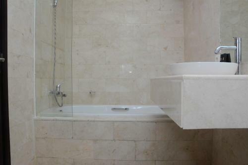 Comfy And Spacious 2br The Masterpiece Epicentrum Apartment By Travelio