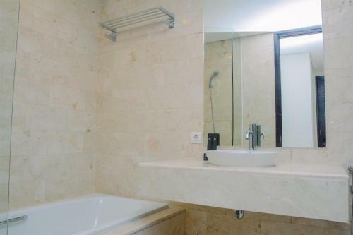 Comfy And Spacious 2br The Masterpiece Epicentrum Apartment By Travelio