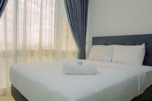 Comfy And Spacious 2br The Masterpiece Epicentrum Apartment By Travelio