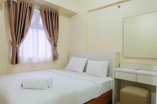 Modern And Comfy 2br Green Pramuka Apartment By Travelio