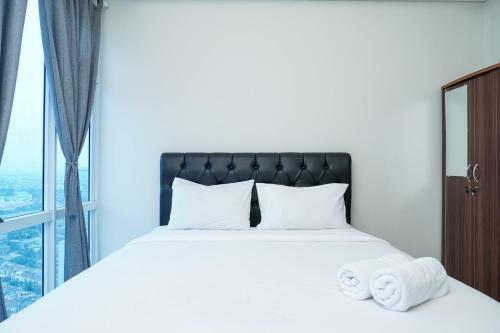 Minimalist Studio Apartment At Puri Mansion By Travelio