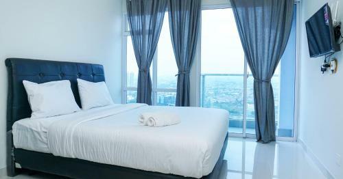 Minimalist Studio Apartment At Puri Mansion By Travelio