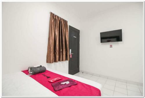 Hostal Reddoorz @ Ruko Itc Roxy Mas