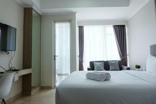 Comfy Studio Menteng Park Apartment By Travelio