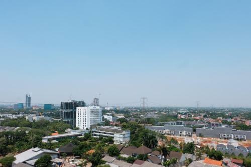 Brand New And Comfy Studio Bintaro Icon Apartment By Travelio