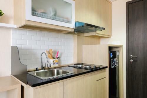 Brand New And Comfy Studio Bintaro Icon Apartment By Travelio