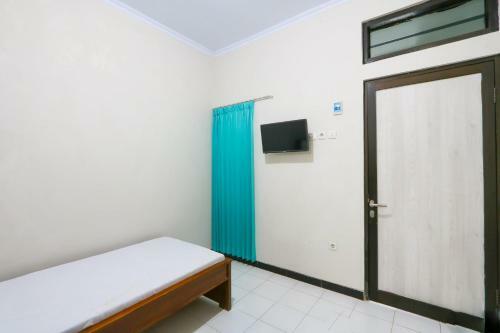 Hotel Oyo Life 3187 Kost Putri Bu Chris