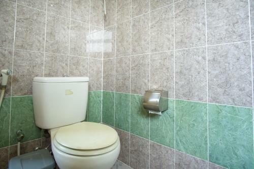 Hostal Reddoorz Near Rumah Sakit Baptis Kediri