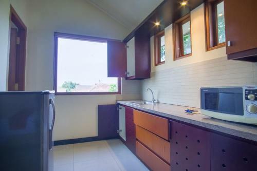 Hostal Reddoorz Near Rumah Sakit Baptis Kediri
