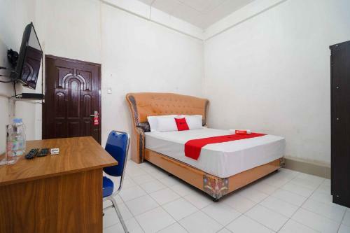 Hostal Reddoorz Syariah Near Stasiun Kereta Api Kisaran
