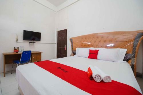 Hostal Reddoorz Syariah Near Stasiun Kereta Api Kisaran