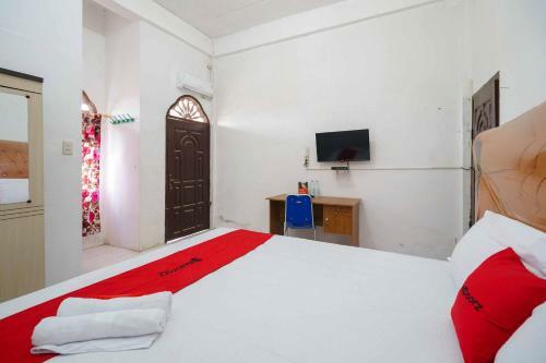Hostal Reddoorz Syariah Near Stasiun Kereta Api Kisaran