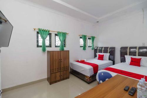 Hostal Reddoorz Syariah Near Stasiun Kereta Api Kisaran
