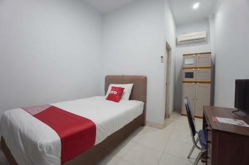 Hotel Oyo 2566 Putri Kesia Rooms