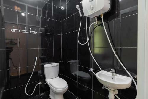 Hostal Reddoorz Near Sun Plaza Medan 2