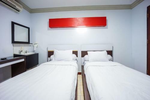 Capital O 3433 Hotel Plaza