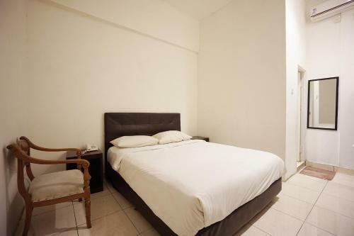 Capital O 3433 Hotel Plaza