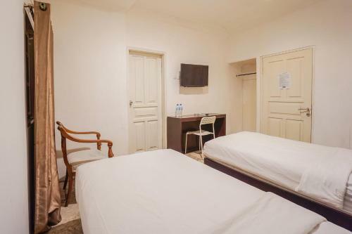 Capital O 3433 Hotel Plaza