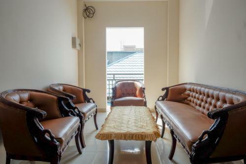Hostal Reddoorz Near Millenium Waterpark Palu