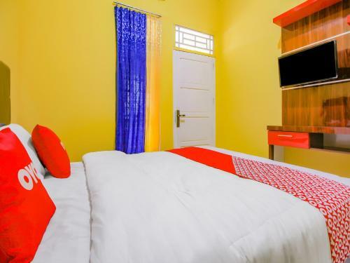 Hotel Oyo 90216 Kost Sanny
