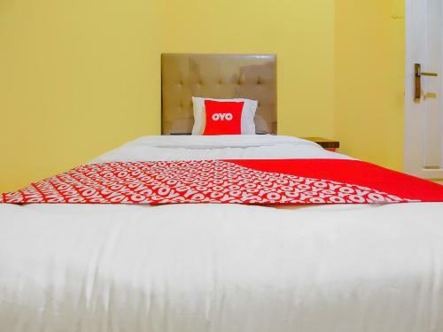 Hotel Oyo 90216 Kost Sanny