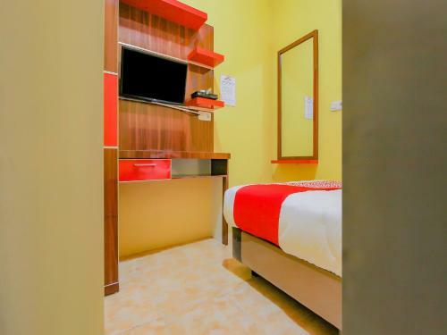 Hotel Oyo 90216 Kost Sanny