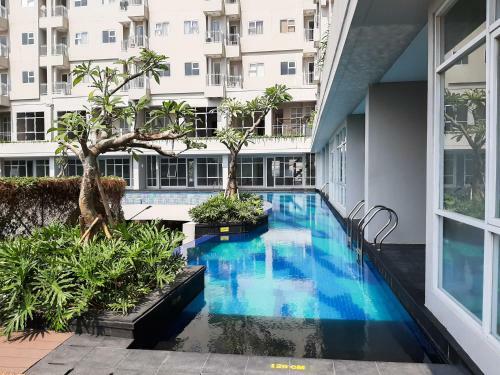 Minimalist And Cozy Studio Bintaro Icon Apartment By Travelio