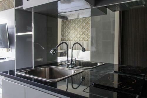 Minimalist And Cozy Studio Bintaro Icon Apartment By Travelio