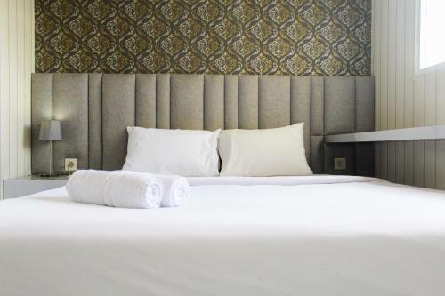 Minimalist And Cozy Studio Bintaro Icon Apartment By Travelio