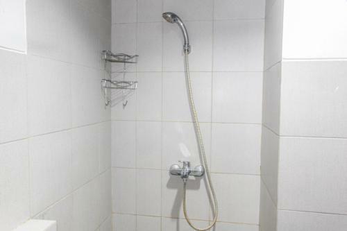 Minimalist And Cozy Studio Bintaro Icon Apartment By Travelio