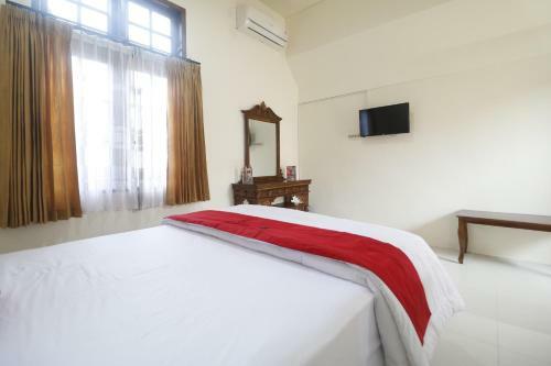 Hostal Reddoorz Near Gelora Delta Sidoarjo