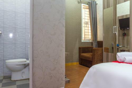 Hostal Reddoorz Plus Near Ipdn