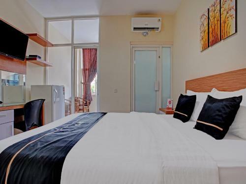 Hotel Oyo 90253 Dhelomi