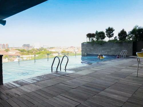 Relaxing Studio Apartment At Tamansari Papilio By Travelio