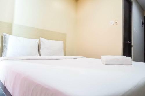 Relaxing Studio Apartment At Tamansari Papilio By Travelio
