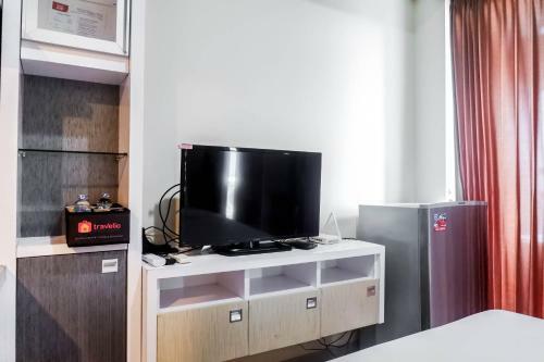 Relaxing Studio Apartment At Tamansari Papilio By Travelio