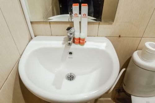Relaxing Studio Apartment At Tamansari Papilio By Travelio