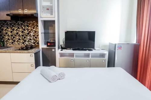 Relaxing Studio Apartment At Tamansari Papilio By Travelio
